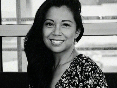 A black and white photograph of Love.Life medical team member, lead functional physician, Dr. Jaclyn Tolentino. 